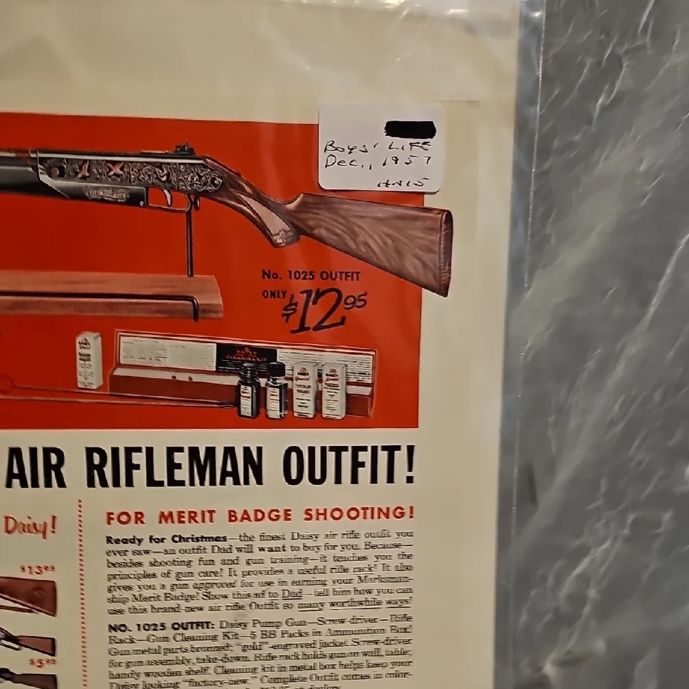 Daisy Air Rifleman Outfit Poster with Red and White Design